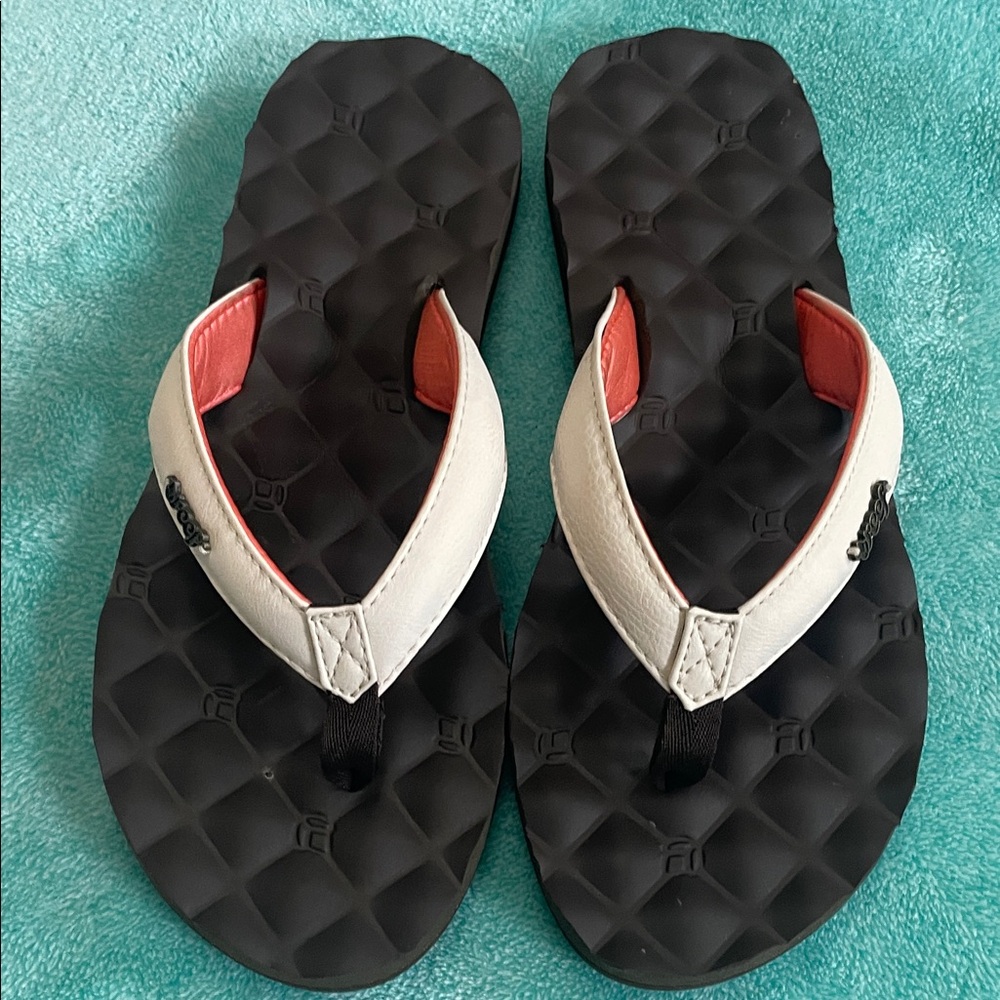 REEF Brown and White Flip Flops with orange Accents